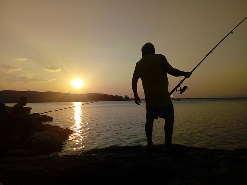 people fishing sunrise sun chalkida greece sea seaside