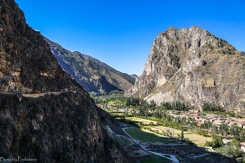 travel peru andes ollantaytambo ancient mountainside sky landscape tree rock ruins field mountain settlement