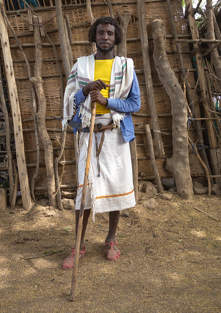 Proud karrayyu tribe man in traditional clothes on a market day, Oromia, Metehara, Ethiopia