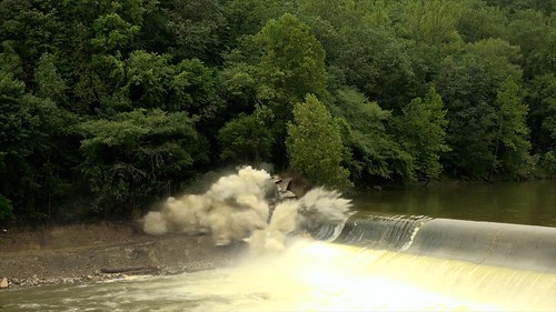 Photo of former Bloede Dam being breached with explosives in September 2018