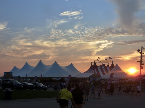 nystatefair fairgrounds fair solvayny tents flags clouds sunset