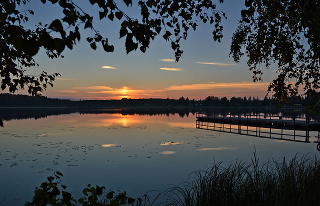 Sunset on the lake. Warm autumn in Finland.