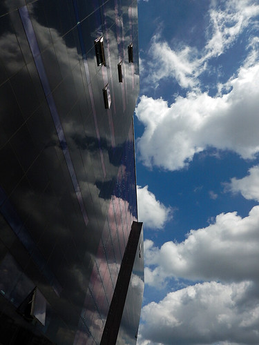 The 'Black Diamond' reflecting the clouds; a modern architecture addition to the old library in Copenhagen, Denmark
