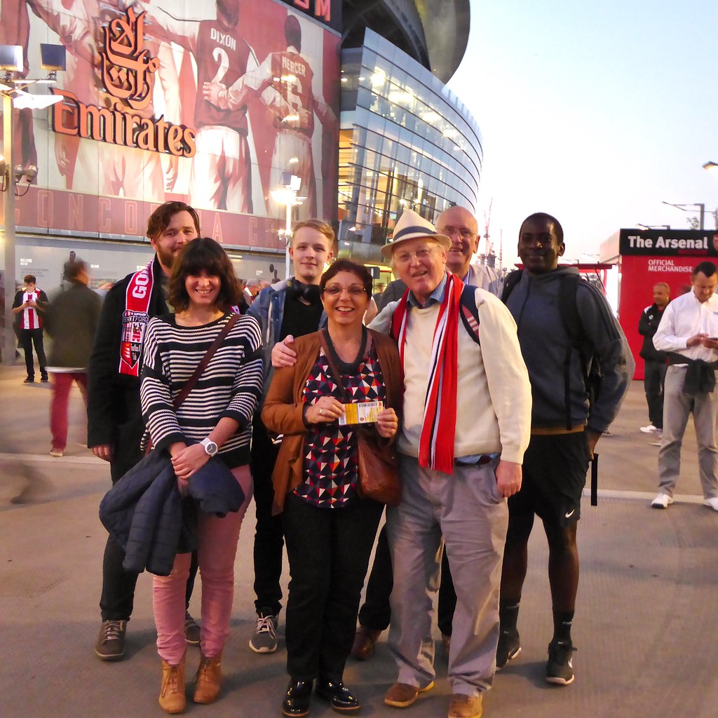 Brentford Fans posing in front of the Arsenal Mural - Sept 2018