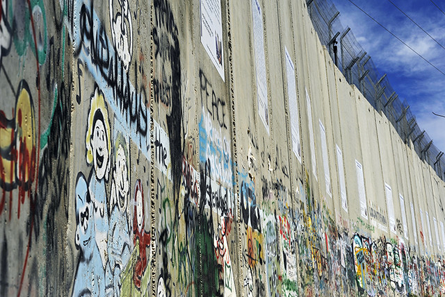 Israeli-built West Bank Wall surrounding Bethlehem with mural art, Bethlehem, West Bank, Israel