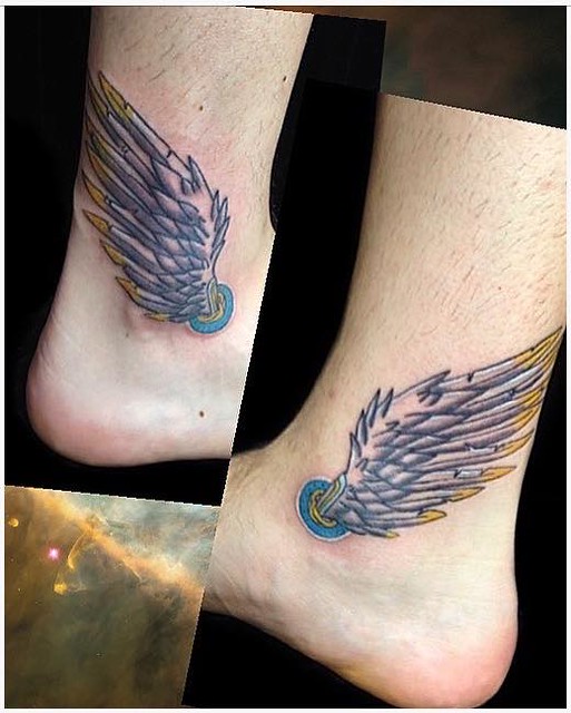 Wing tattoo on the ankle