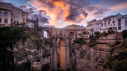 view landscape suneet nature andalucia city ronda clouds sun spain travel photography sky cityscape photo europe geotagged bridge málaga es onsale portfolio