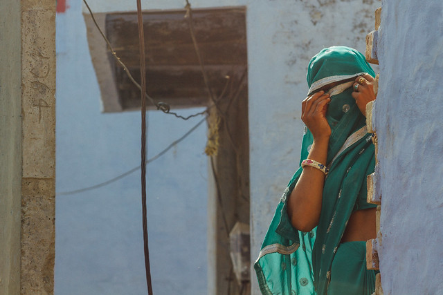Woman Peeking Through Sari Veil