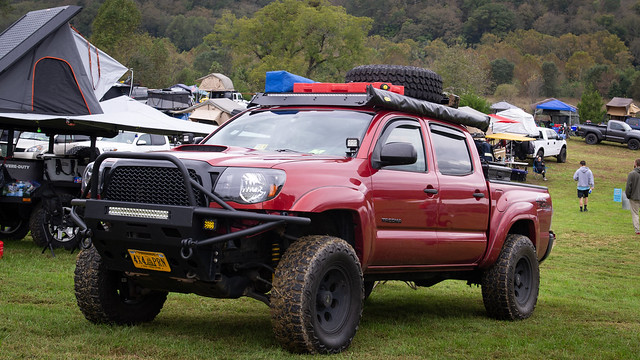The Toyota Tacoma is a trusty friend of the overlander--this one caught our eye with its brush guard, lifted suspension, awning among other off road necessities. 