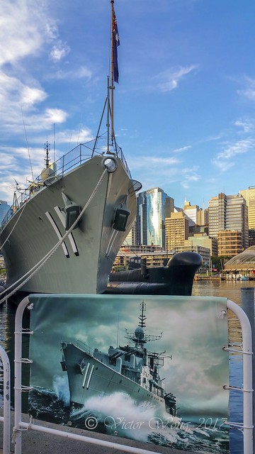 Destroyer HMAS Vampire moored with a promotional canvas