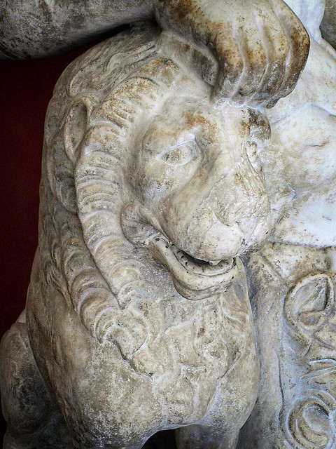 Closeup of Lion in sculpture of Dionysos with lion garden statuary from Latium region of Italy Roman marble
