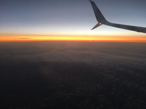 sunset plane clouds