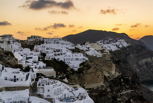 santorini greece greek houses cliff clouds sunrise sunset yellow village white