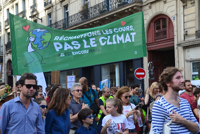 Climate change protesters march in Paris streets