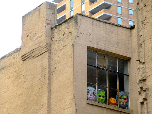 Uncle Fester Pumpkin and Masks in Front Window 4029A | by Brechtbug