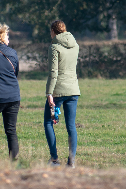 Nice thin girl in jeans walking the dog 3