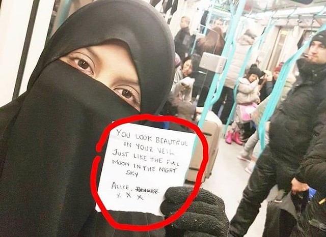 3962 A Woman wearing Niqab receives an unexpected Note from a Stranger 02