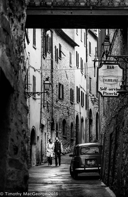 Volterra Street Couple Walking.jpg