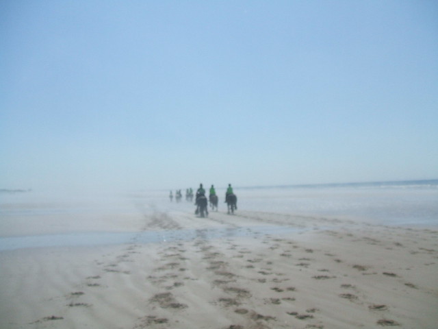 Riders on the sands.