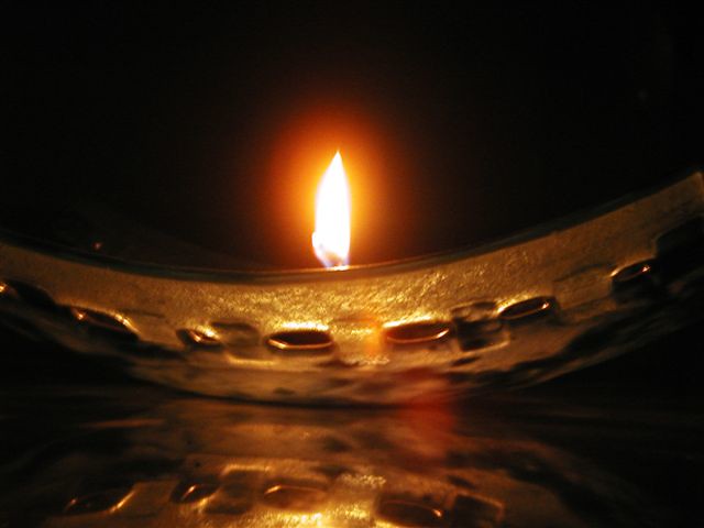 Candle on Glass