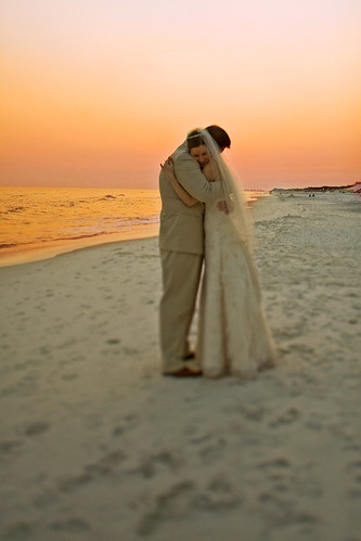 wedding sunset love beach groom bride seaside interestingness sand hug marriage