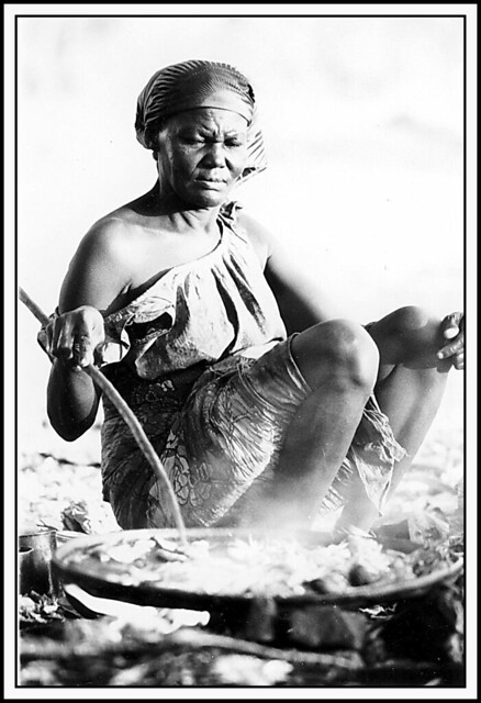 Gabon. 1975. Woman cooking meals