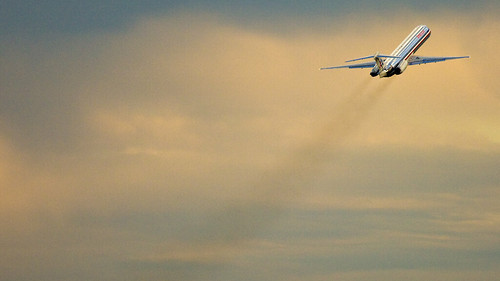 IMG_1244 by midendian, American MD-83 departing KSFO runway one right at sunrise.  Love the American livery at sunrise/suns