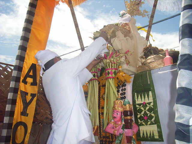 bali priest offering