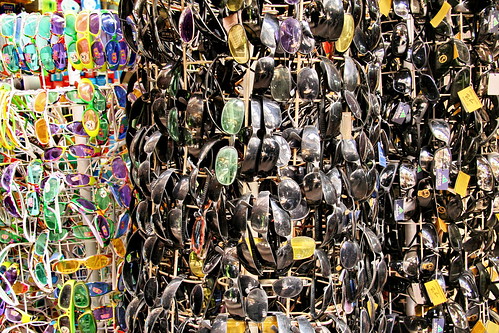 sunglasses shop deirezzur deirezzor dayrazzaur euphrates alfurat street urban city photojournalism market bazaar souq shopping cannon people strangers islam muslim travel trip world global backpack
