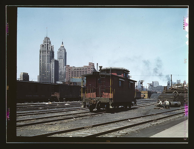 General view of part of the South Water street freight depot of the Illinois Central Railroad, Chicago, Ill. A C and O R.R. caboose. the C and O is one of the railroads that lease terminal facilities from the I.C.R.R  (LOC)