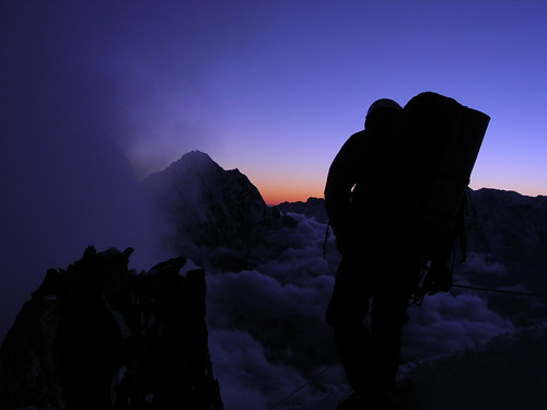 Ama Dablam Expedition, Nepal by distantpeak, Marcus is arriving Camp 2 in darkness. We are tired after a long and eventful summit day.nepal sunse