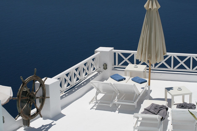 A ships wheel in a hotel lounge area in Fira, Santorini