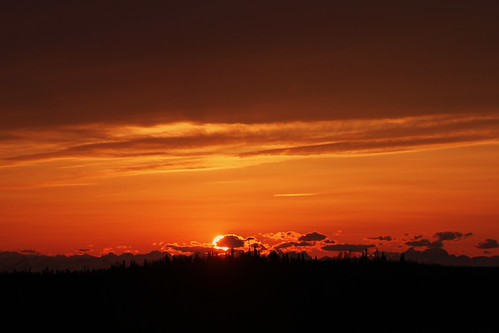 Sunset in the Valley by dstsentry, watching another late night sunset from the windowsunset skysun treesmountains