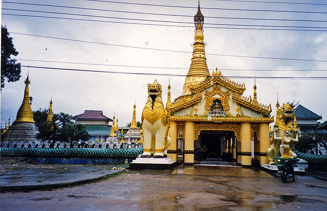 Golden Temple Entrance with lions and Nagas (dragons,) Myawaddy, Myanmar / Burma