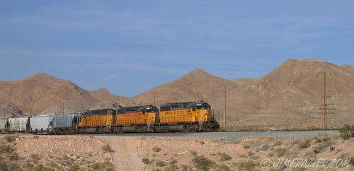 april 2007 train railroad apex apexjunction nevada q3 gypsum business commerce engineering technology industry industrial transportation vehicle power powerful mighty might railfan metal locomotive engine engines railway machine rail tracks rails sunny clear fair scenery landscape freighttrain freight siding up unionpacific rural country countryside desert orange brown apr2007seminarswings lasvegastrains interestingness481 2008calpot projecttrainfromeachstate explored bookmarkprint ©jimfraziercom v1000 infrastructure edgewaterpresentationapril2016 pop6