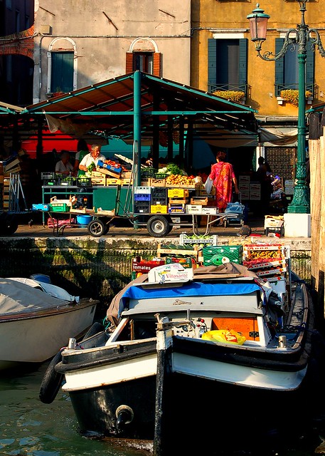 Delivery vessel at a produce stand in Venice, Italy