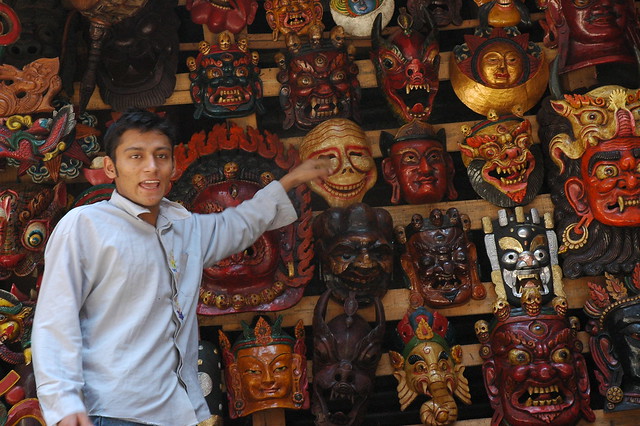 Street hawker of Nepalese Carved Masks Kathmandu Nepal