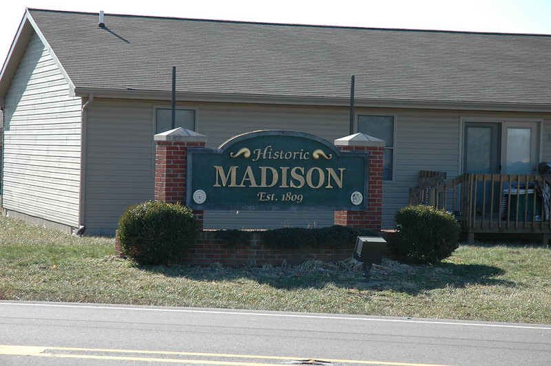 Welcome sign to Madison, Indiana on the Madison State Road for traffic on southbound Lanier Drive (IN-7).