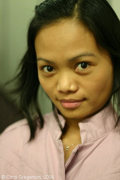 Young Asian Woman with a Serious Expression
