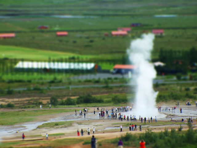 Little people watching the Geyser