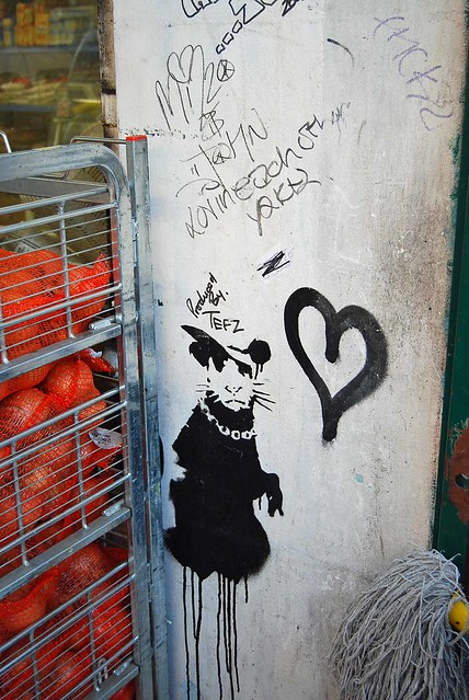 Banksy rat and heart - close up.