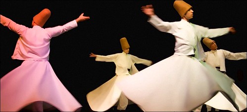 Whirling Dervishes - embracing the world by Teobius