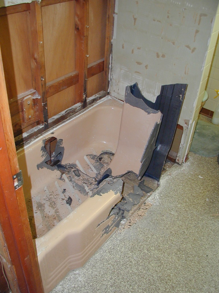 Smashing the cast iron tub Dan Larson Flickr
