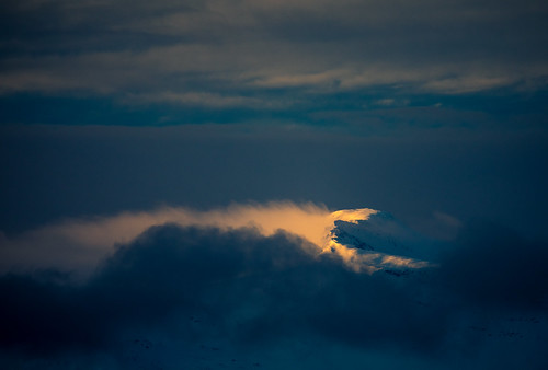 tromsø troms norway no mountain mountains clouds sunrise sun snow winter cold blue orange yellow