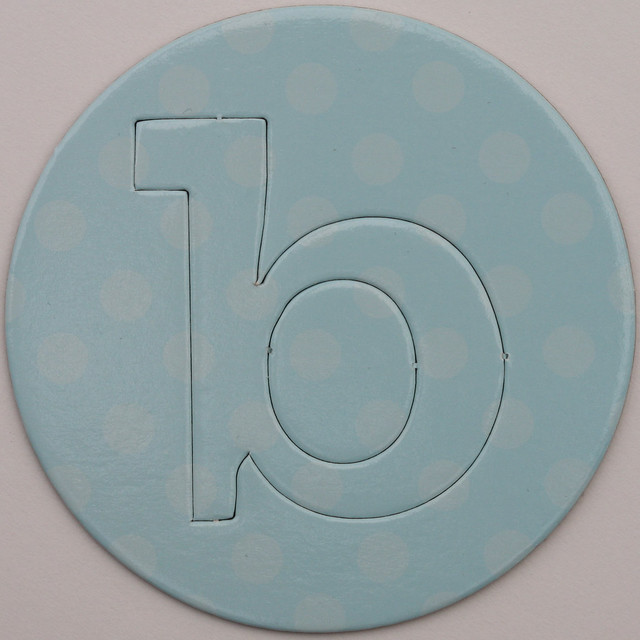 card disc with push out letter b