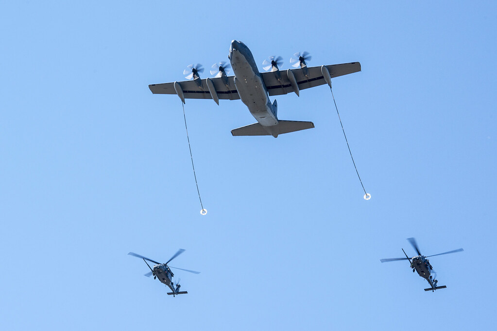 A Pair of HH-60 Pave Hawk Helicopters-Refueling from HC-130J Combat King 