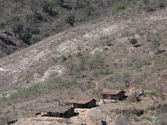 Three houses - Tres casas en el camino a Cubulco, cerca de Rabinal, Baja Verapaz, Guatemala