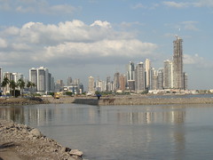 view of Panama City with many highrises and even more cranes. Looks like Miami.