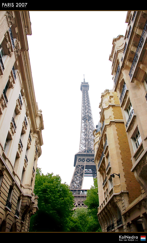 Eiffel tower through Paris streets