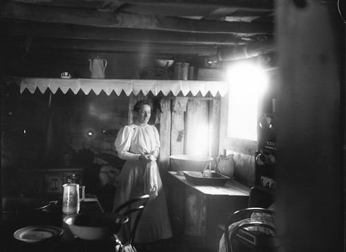 Woman inside a settler's hut | by Powerhouse Museum Collection
